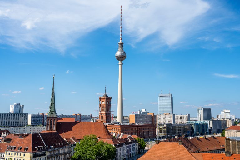 the-famous-tv-tower-of-berlin-with-the-town-hall-2022-06-08-15-57-07-utc